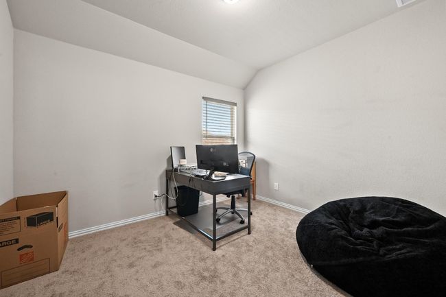 Office featuring carpet floors and vaulted ceiling | Image 24