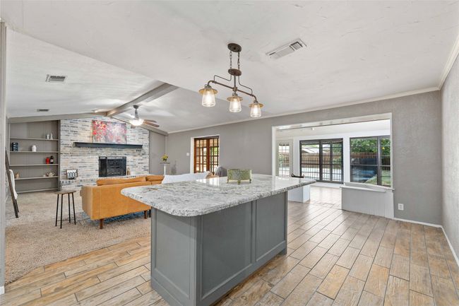 Kitchen featuring island | Image 13