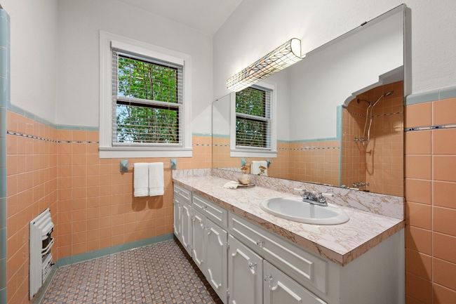 Hall bathroom located between study and 2nd bedroom. | Image 18