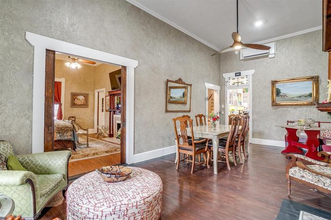 Another view of Lobby with double oak library doors interior entrance to our keller's Studio | Image 15