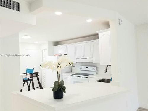 404-3-1670 Ne 191st St, Miami, FL, 33179-4101 | Card Image