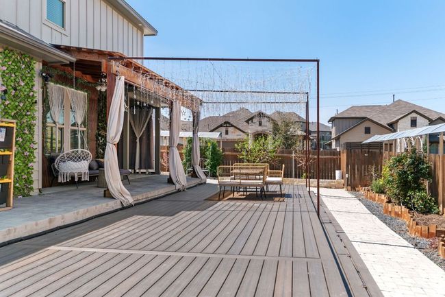 Wooden terrace with fence and outdoor dining space | Image 36