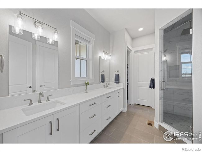 Dual Sinks and Tiled Shower | Image 14