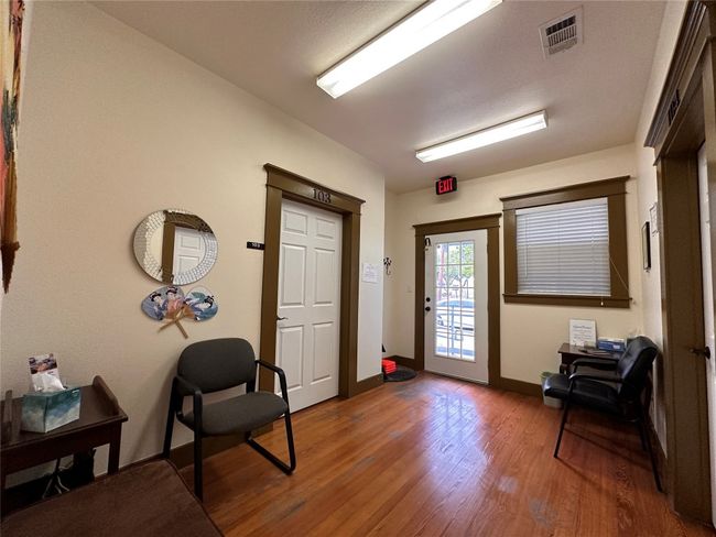 Foyer featuring wood finished floors and baseboards | Image 19