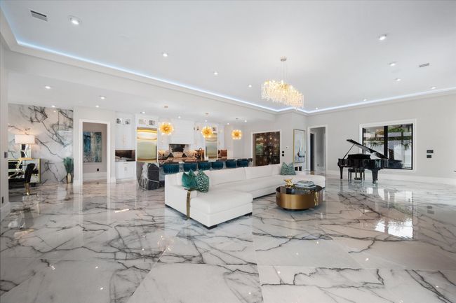 Living area featuring recessed lighting, a chandelier, marble finish floor, and visible vents | Image 8
