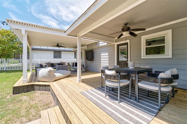 Newly remodeled covered patio with dining area | Image 25