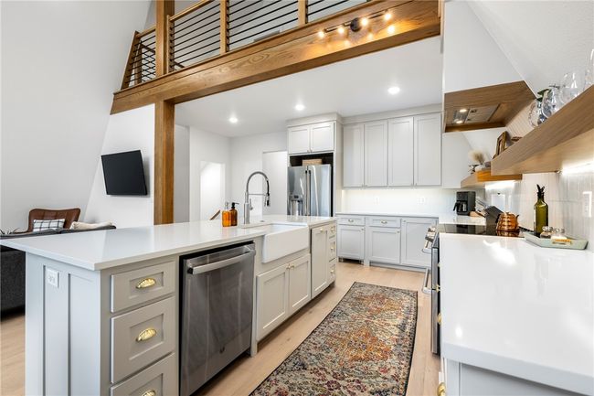 Quartz counter tops and farmhouse bid sink. | Image 9