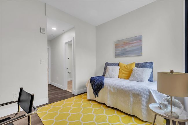 Bedroom featuring wood finished floors, baseboards, and recessed lighting | Image 18