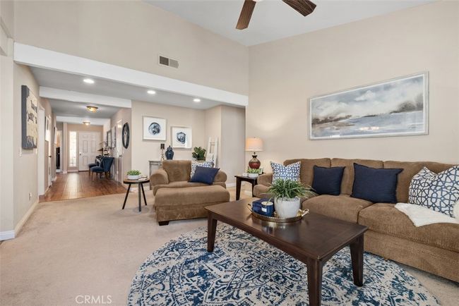 Here is a view from the living room into the front entry area | Image 15