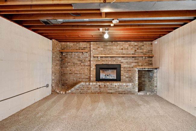 Lookout Lower level has additional bedroom, huge family room with gas fireplace, cedar closet, workshop, storage room and walk-in pantry storage - LOTS OF STORAGE! | Image 31