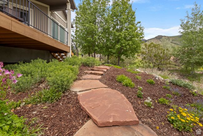 View of yard featuring a mountain view and stairs | Image 38
