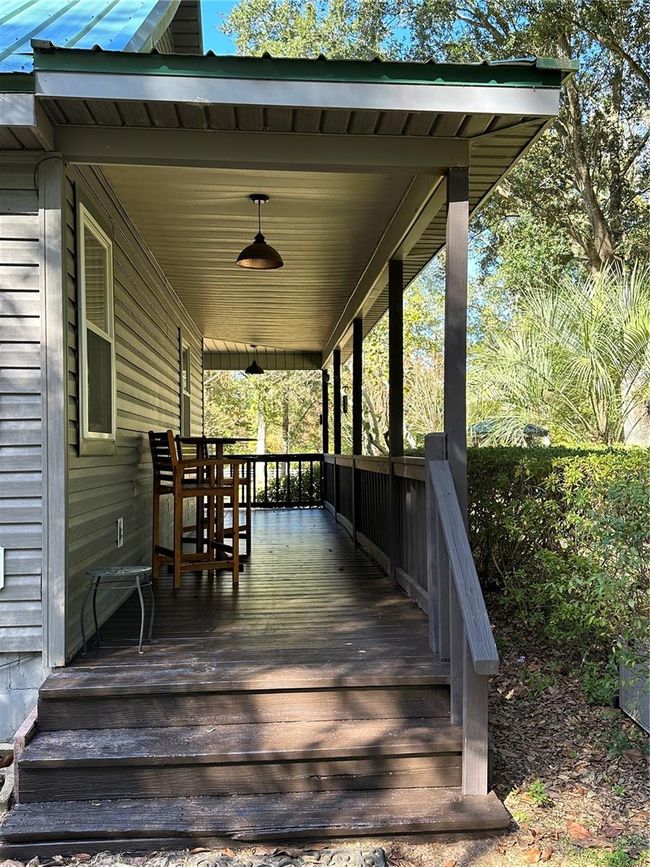 MORE WRAP AROUND COVERED PORCH | Image 62