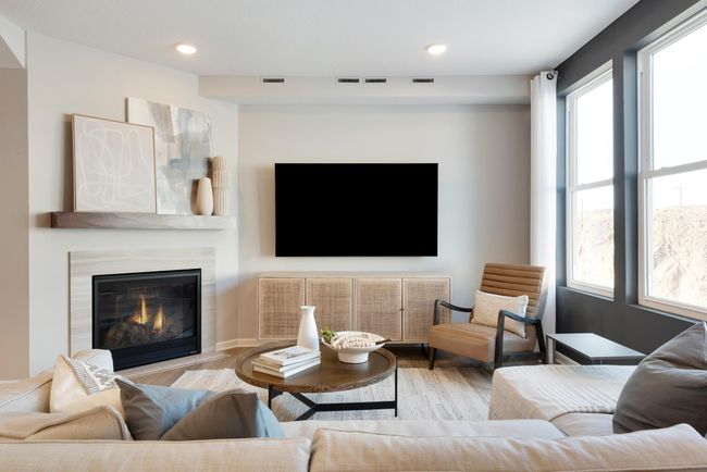 Cozy up on those cold Minnesota night to your gas fireplace! (Option varies home to home). Photo of model home. | Image 7
