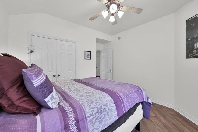 Another view of Bedroom 2. Every bedroom has a fan to help keep energy bills low during those hot Texas summers. | Image 28