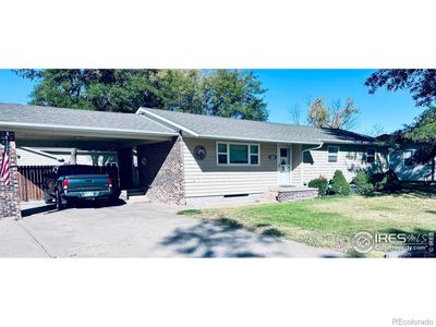 East facing home with carport | Image 1