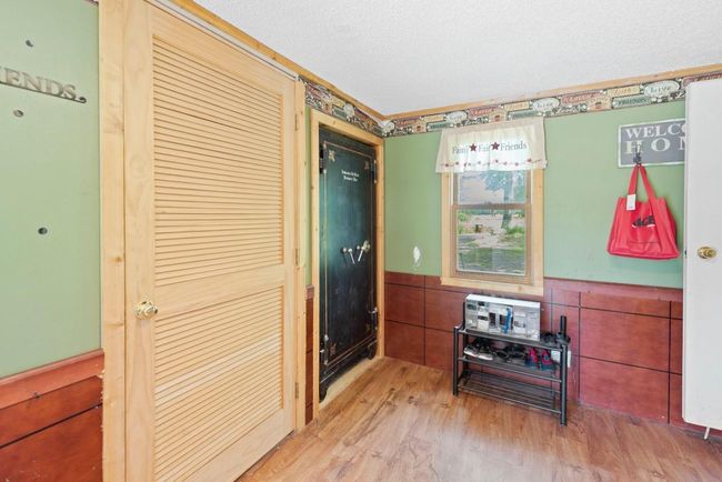 Mudroom/porch- Large safe for sale for $1000. | Image 20