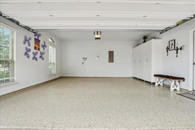 Custom cabinets and epoxy flooring | Image 3