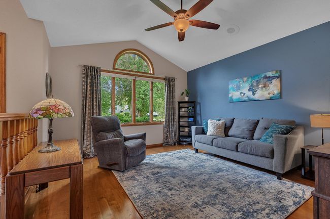 Main level living room with wood flooring | Image 5