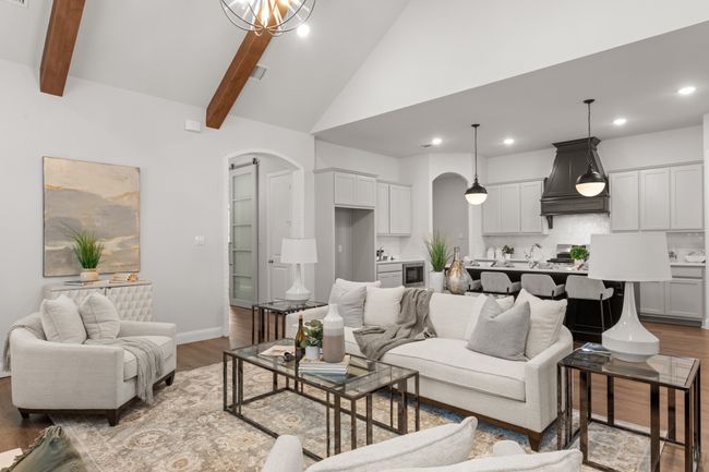 A view of the large island and quartz countertops. | Image 12
