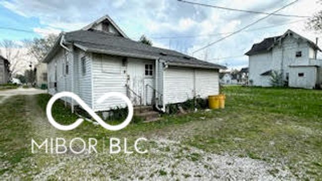 back of house featuring a yard | Image 16
