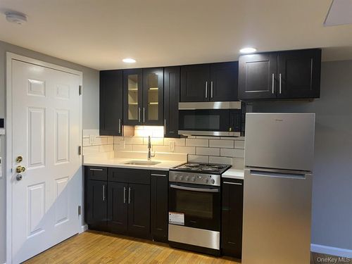 203-94 4th Ave, Bay Shore, NY, 11706-7951 | Card Image