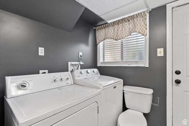 Washroom featuring independent washer and dryer and half bath | Image 19