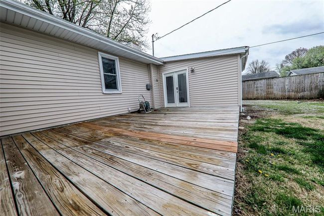 Wooden terrace featuring fence and french doors | Image 19