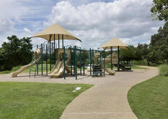 Communal playground with a lawn | Image 38
