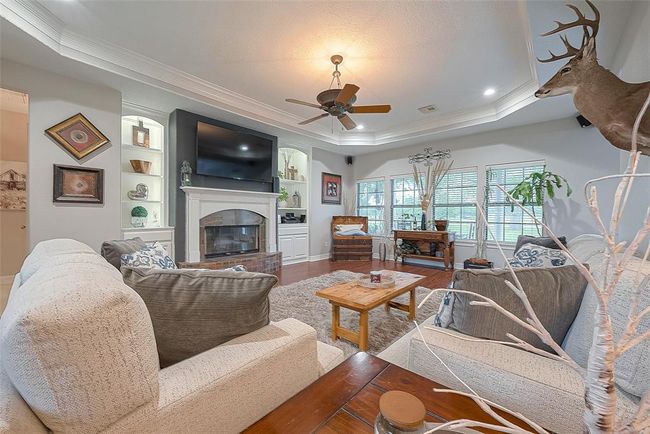 Living room is large and features gas fireplace | Image 5