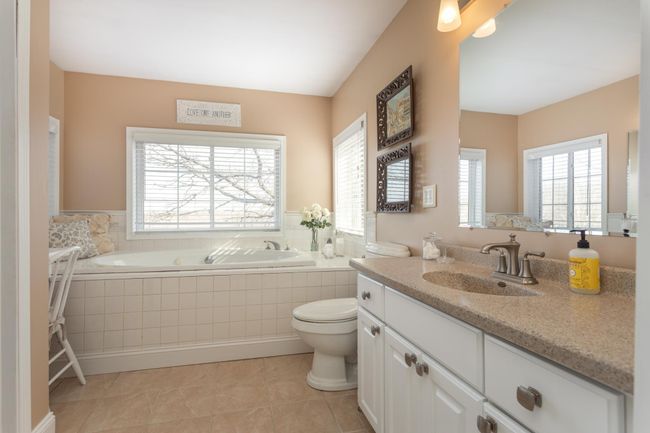 Primary bath jet tub and sink | Image 20