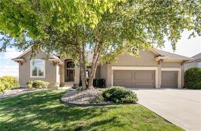 Welcome to 10009 Warwick Street in Lenexa's Falcon Valley golf course community. | Image 1