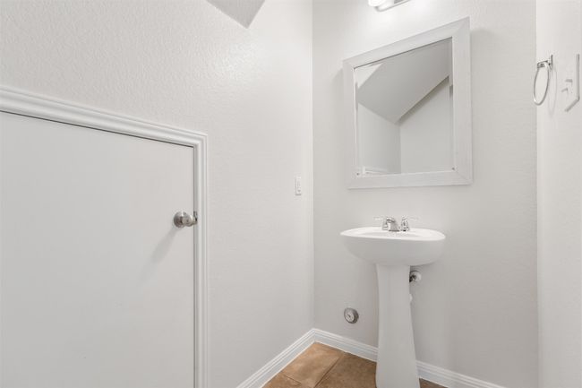 Bathroom featuring tile patterned flooring and a sink | Image 28