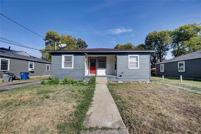 Bungalow-style home with a front lawn | Image 1