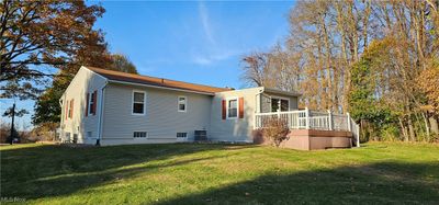 Back of property featuring a wooden deck | Image 3