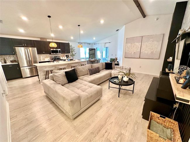Living room and kitchen view from foyer | Image 8