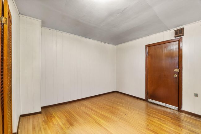 Empty room featuring light wood-style flooring and baseboards | Image 27