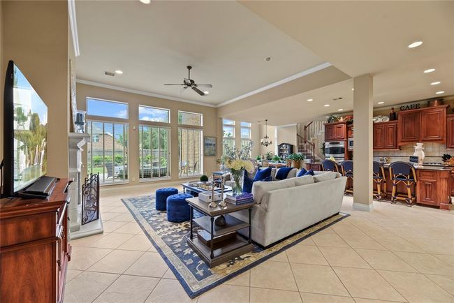 Family Room offers view of the back patio. | Image 14
