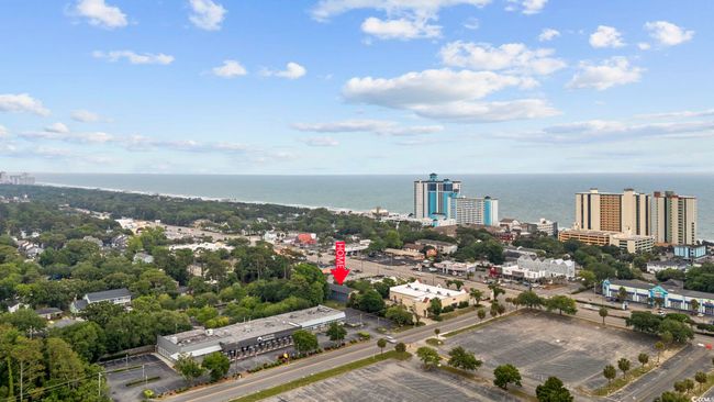 View of urban area featuring a large body of water | Image 17
