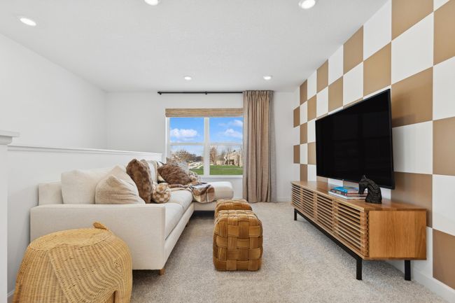 (Photo of a decorated model, actual homes finishes will vary) So much extra space in this loft! | Image 9