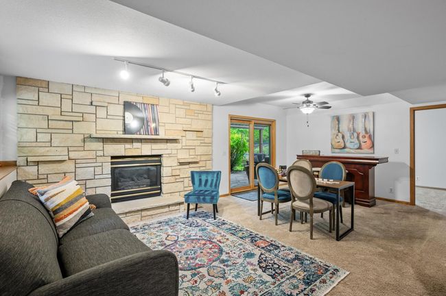 Enjoy the walk out to covered patio and expansive backyard. | Image 29