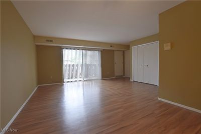 Spare room featuring hardwood / wood-style floors | Image 3