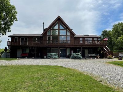 Front of Beautiful log home on Lake Viking Terrace side. | Image 1