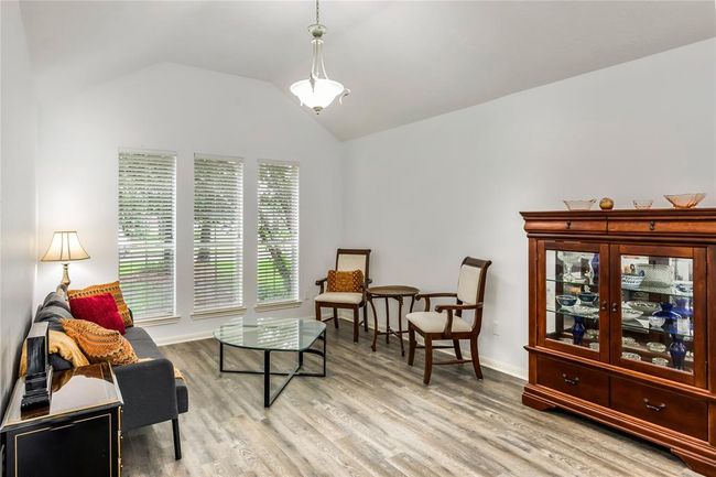 Formal living space with beautiful windows | Image 6