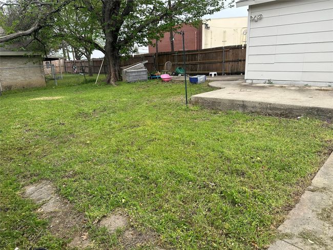 View of yard featuring a fenced backyard | Image 16