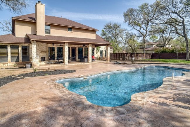 Gorgeous in ground swimming pool makes this back yard your personal oasis. Perfect for entertaining family and friends in the summer. | Image 38