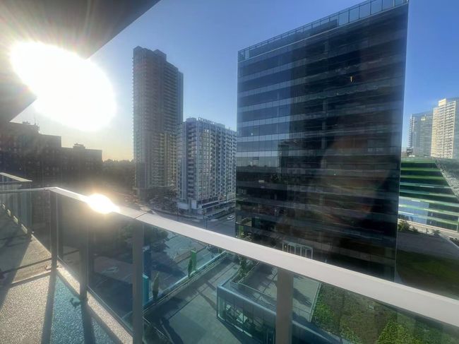 Balcony with a view of city | Image 9
