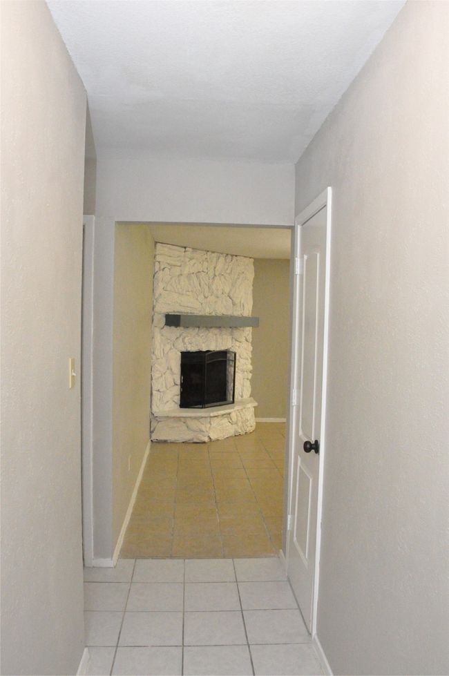 View from the front door featuring light tile patterned floors and baseboards | Image 4