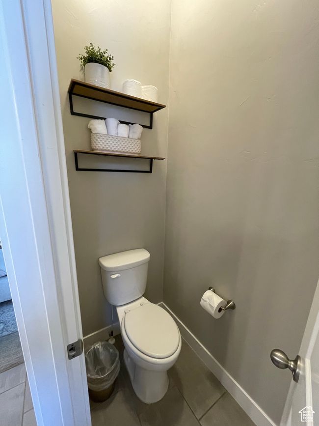 Separate toilet room across from vanity | Image 33