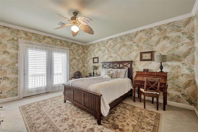 2nd living level - secondary bedroom opens up to deck with magnificent views of Jones Bay. | Image 31