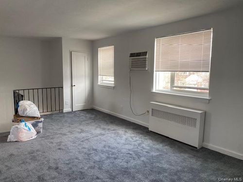 f-2-245-47 76th Avenue, New York, NY, 11426 | Card Image